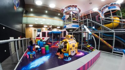 Astrogarden indoor play area with slides and play equipment