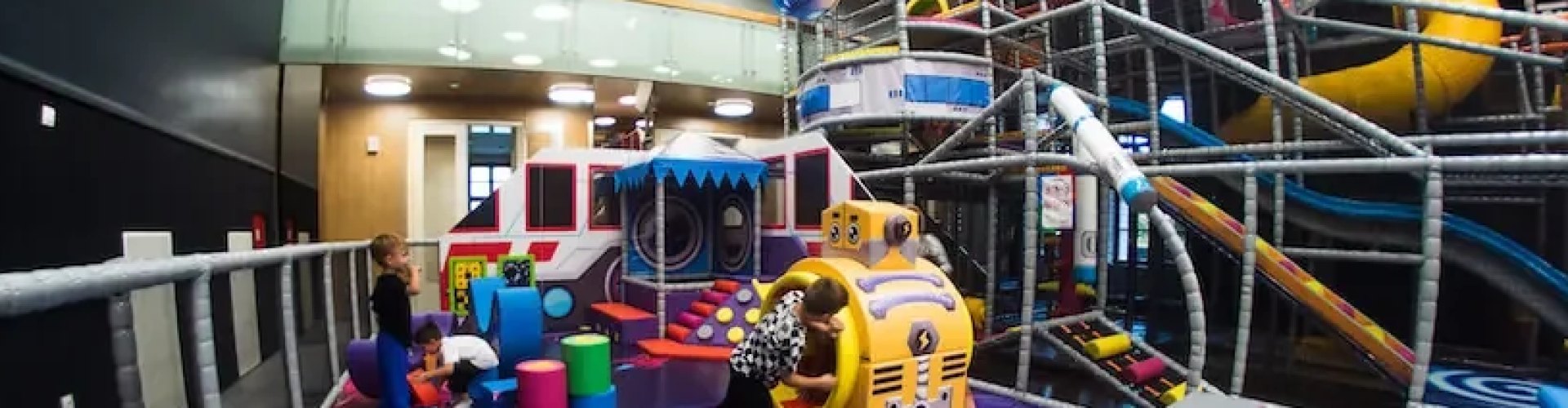Astrogarden indoor play area with slides and play equipment